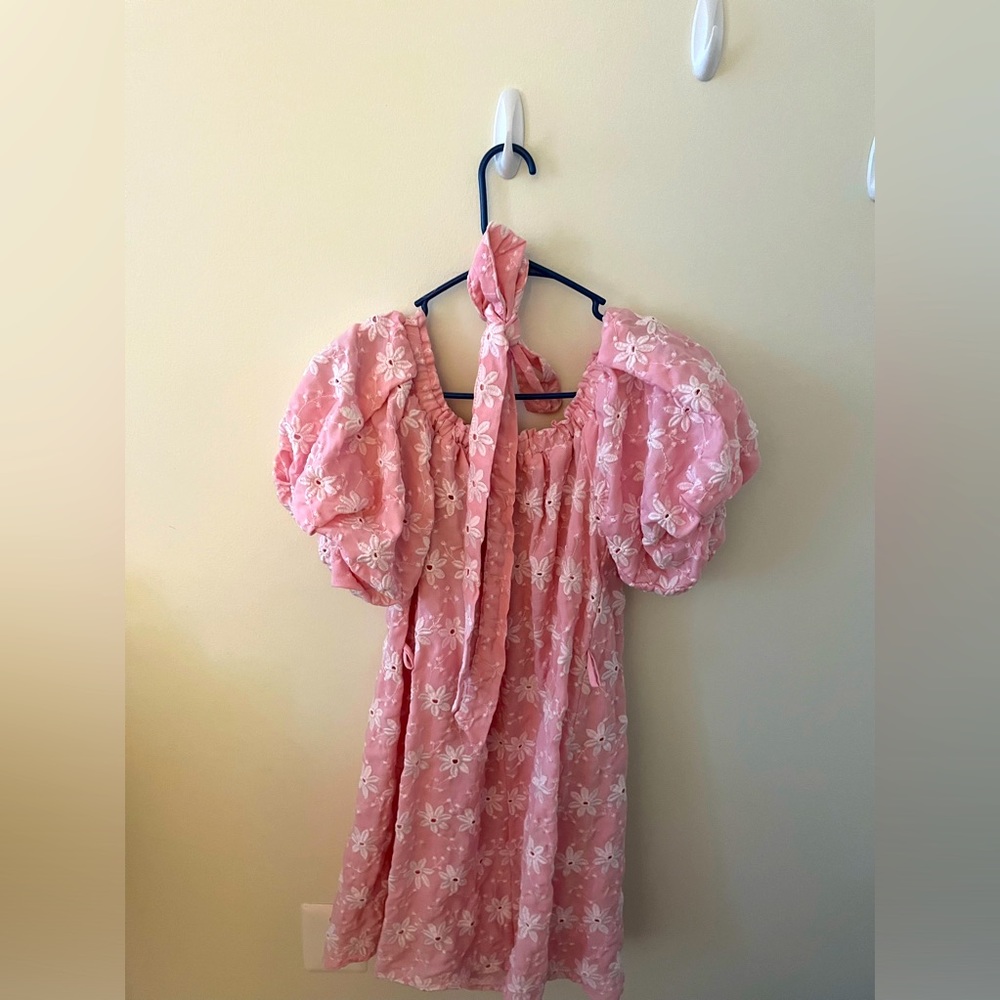 A pink floral dress . Bought from turkey size 34 . 86% polyester 14% cotton